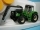  Traktor s nakládacími vidlemi 1:32 Cararama 